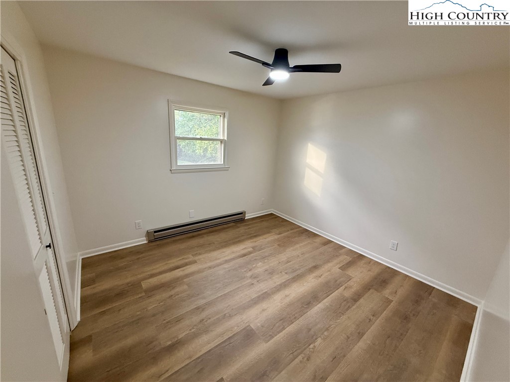 130 Maple Drive Boone, NC 28607 - Photo 16 of 21 an empty room with a empty space and windows