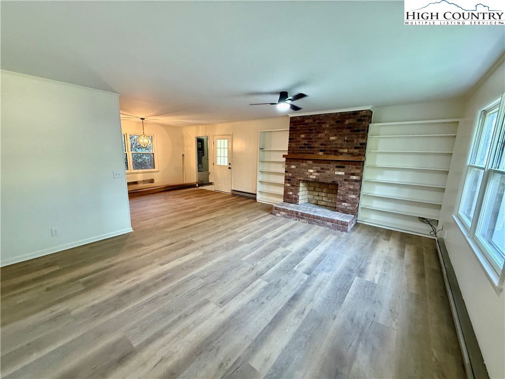 130 Maple Drive Boone, NC 28607 - Photo 10 of 21 wooden floor in an empty room with a window
