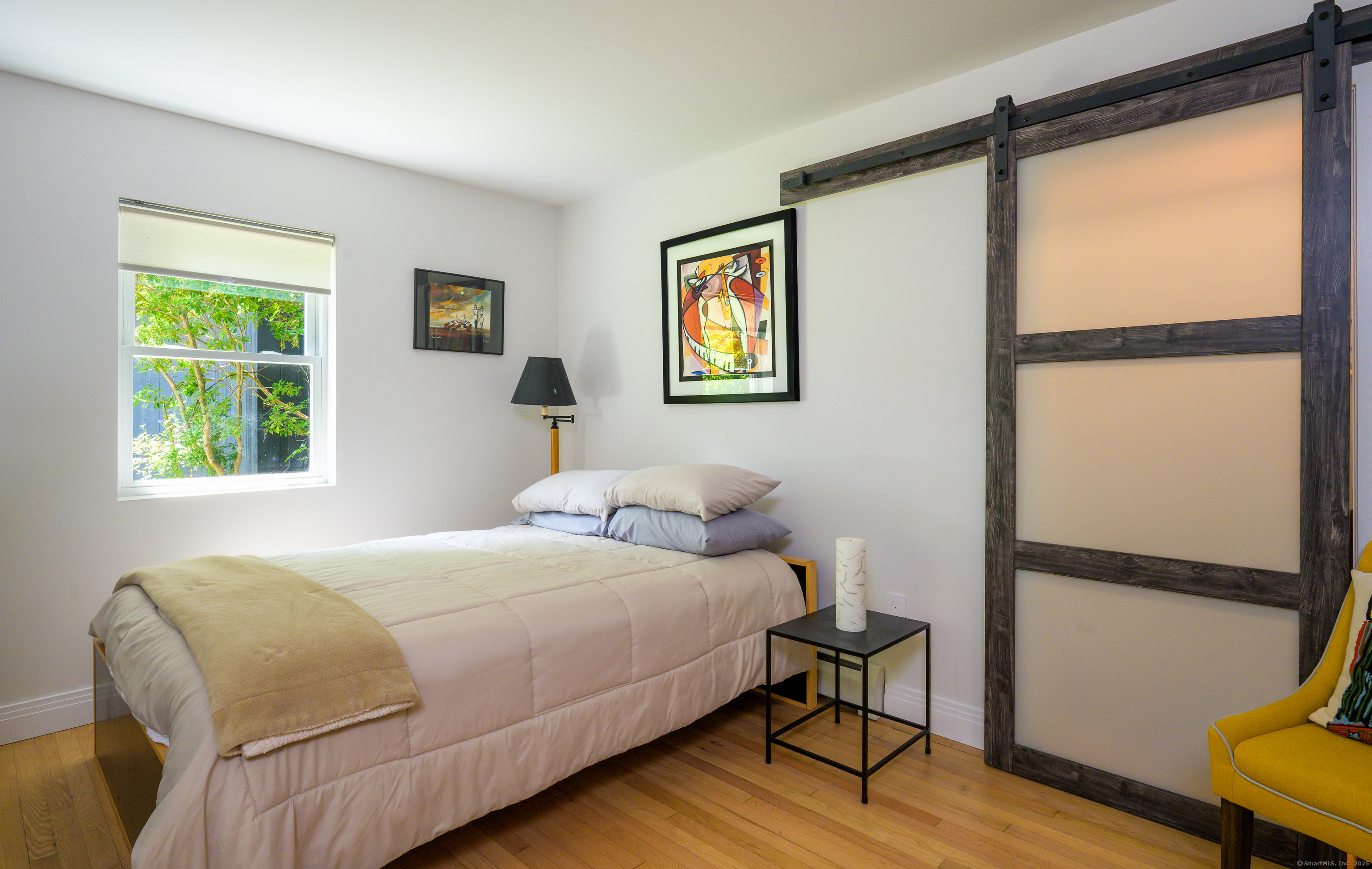 35 Kirk Road Sharon, CT 06796 - Photo 33 of 40 a bedroom with a bed and a window