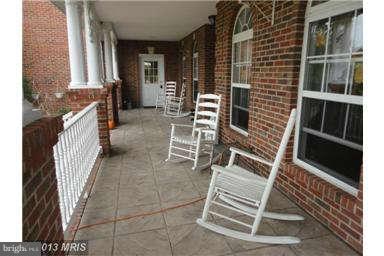 7000 Old Solomons Island Road Friendship, MD 20758 - Photo 2 of 30 Part of the wrap around porch