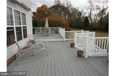 7000 Old Solomons Island Road Friendship, MD 20758 - Photo 26 of 30 Deck from Family Room overlooking Pool and Farm
