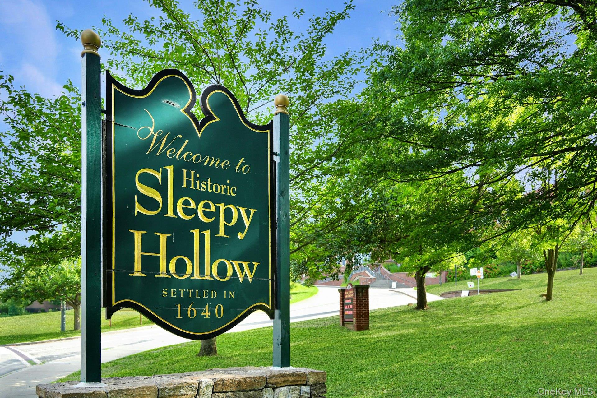 147 Beekman Avenue, Unit 1 Sleepy Hollow, NY 10591 - Photo 11 of 22 a sign that is on a tree