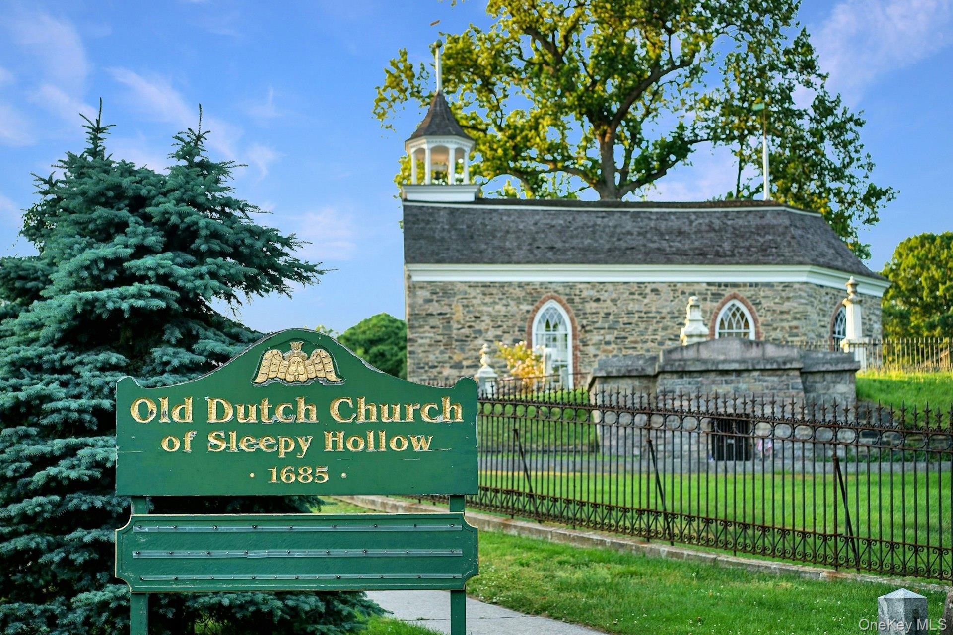 147 Beekman Avenue, Unit 1 Sleepy Hollow, NY 10591 - Photo 12 of 22 a sign on the side of a building