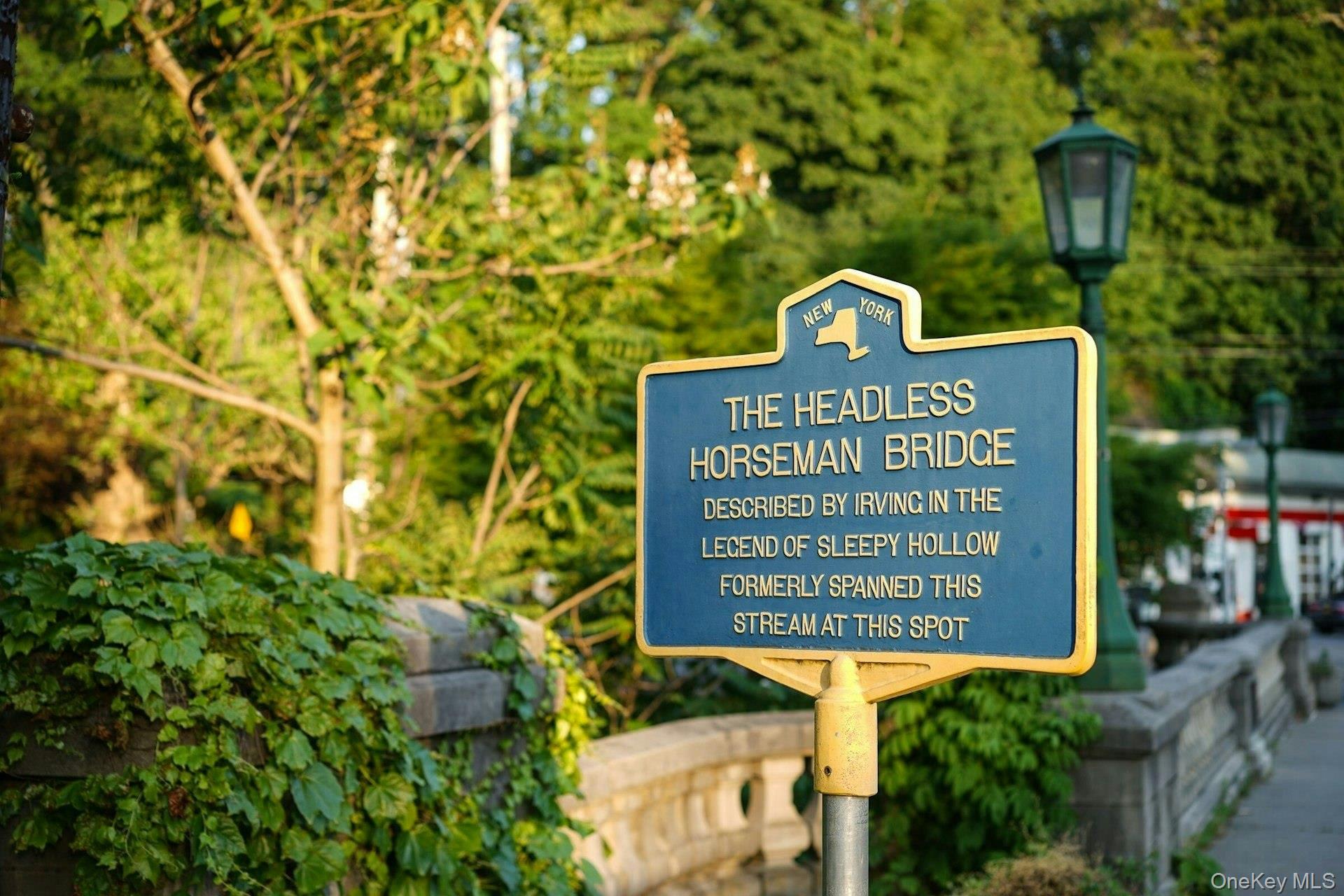 147 Beekman Avenue, Unit 1 Sleepy Hollow, NY 10591 - Photo 13 of 22 a sign on the side of a building