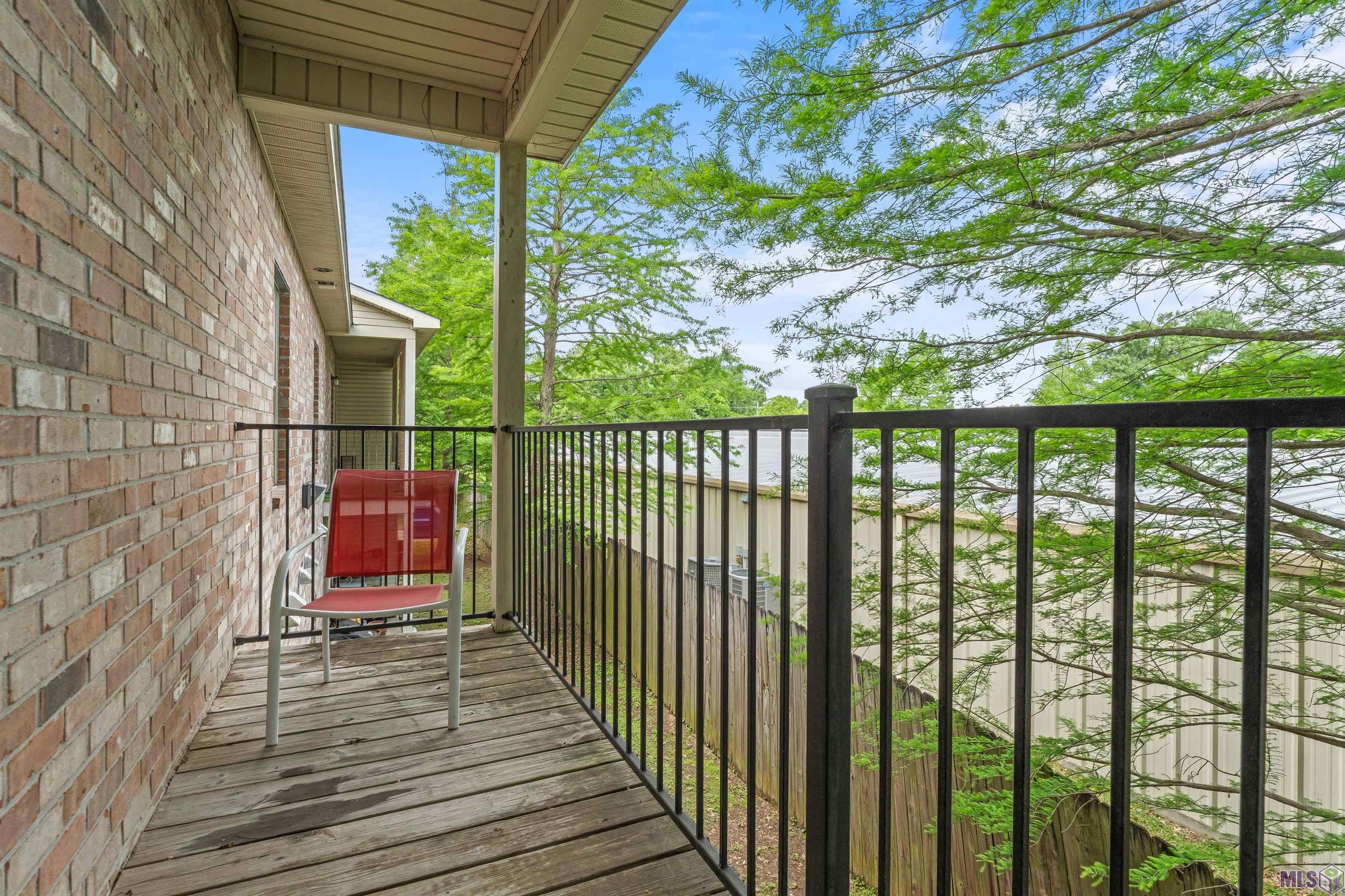 818 Meadow Bend Drive, Unit G Baton Rouge, LA 70820 - Photo 14 of 17 Balcony off primary bedroom