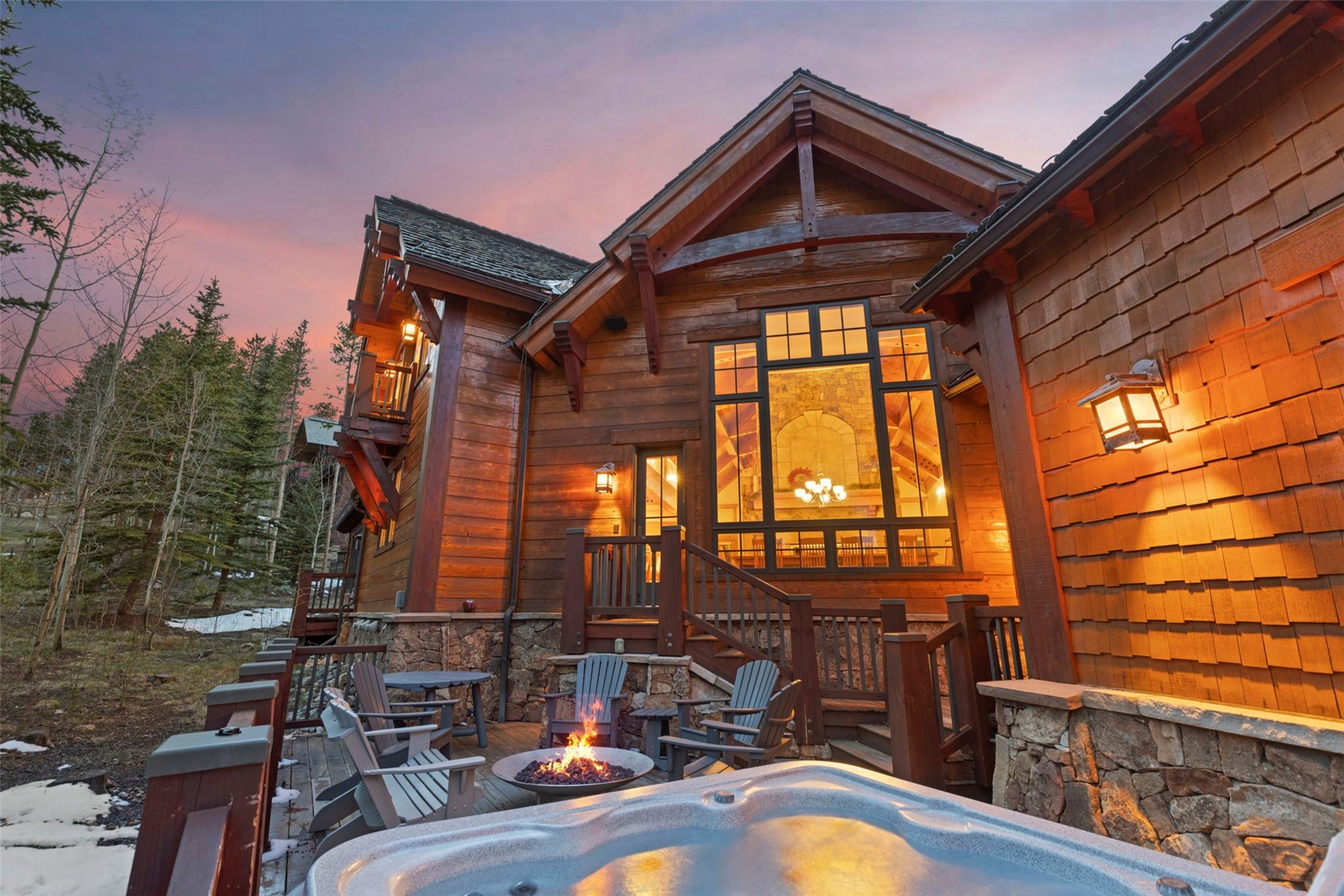 317 Timbertrail Road Breckenridge, CO 80424 - Photo 5 of 50 a view of a balcony with table and chairs with wooden floor and fence