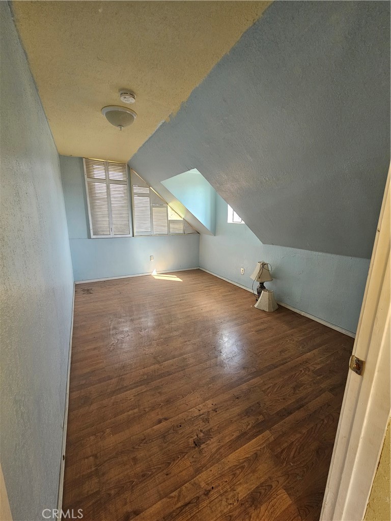 4276 Maxson Road El Monte, CA 91732 - Photo 13 of 17 an empty room with wooden floor and windows
