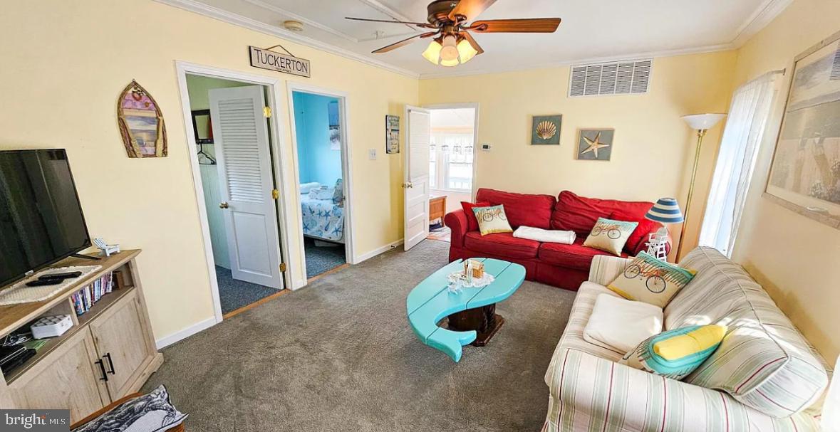 1022 South Green Street Tuckerton, NJ 08087 - Photo 6 of 20 a living room with furniture and a flat screen tv
