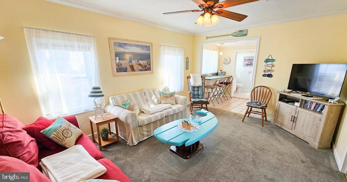 1022 South Green Street Tuckerton, NJ 08087 - Photo 7 of 20 a living room with furniture and a flat screen tv