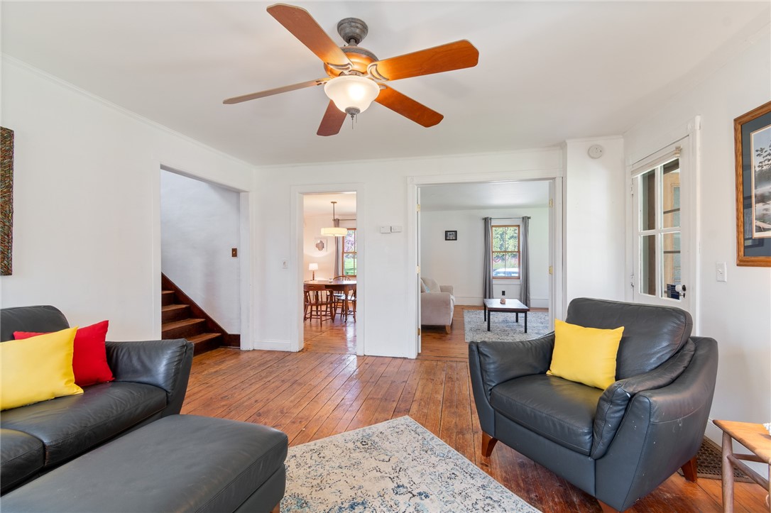 4427 Boynton Road Walworth, NY 14568 - Photo 17 of 49 The living room - there’s even a WOOD BURNING STOV