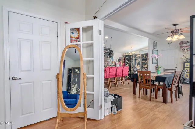 a bedroom with a bed and cabinets