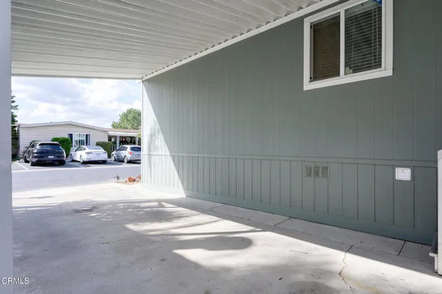 an aerial view of house with a yard