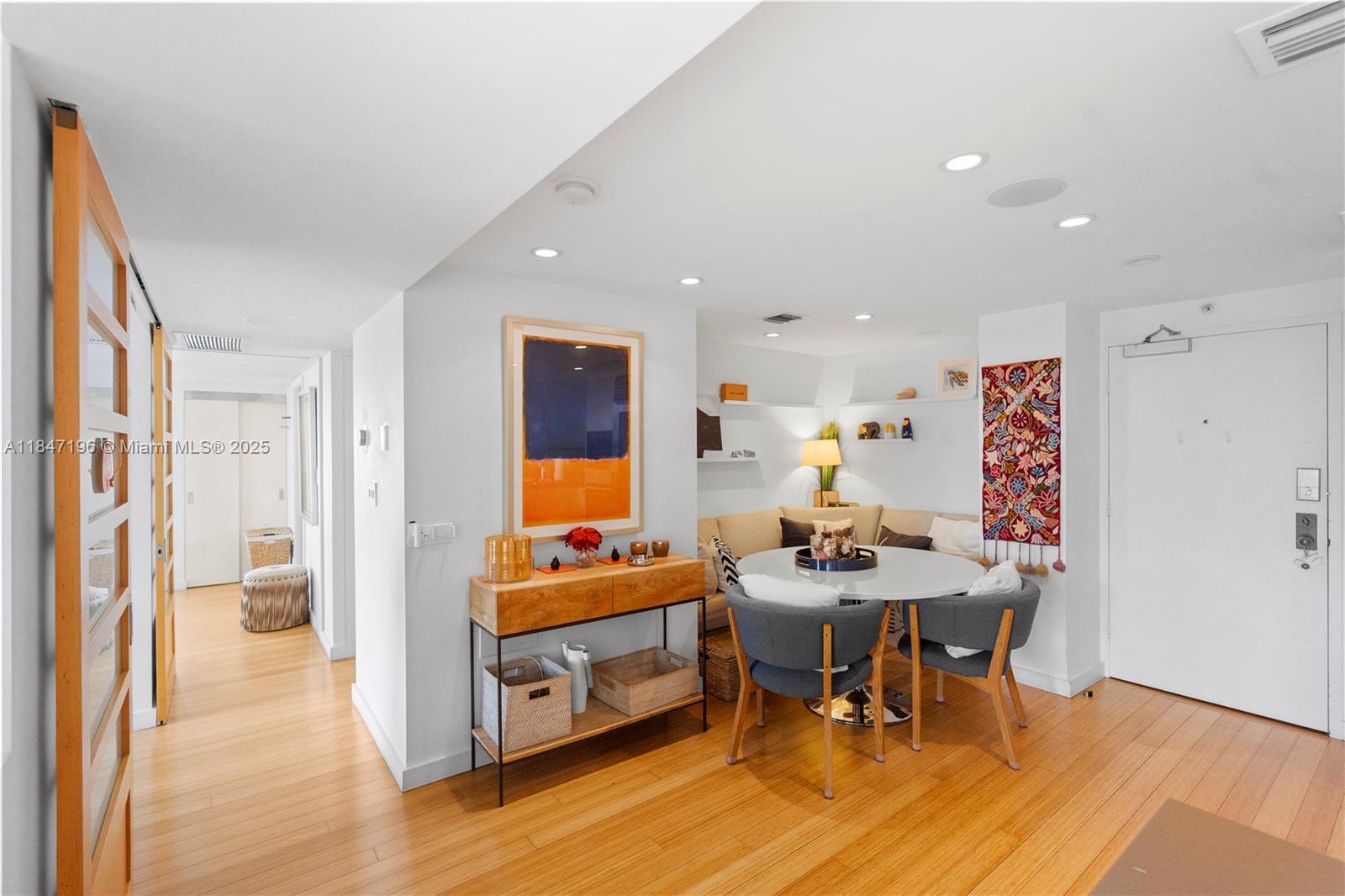 Brickell Miami, FL 33129 - Photo 11 of 44 a dining room with furniture and wooden floor