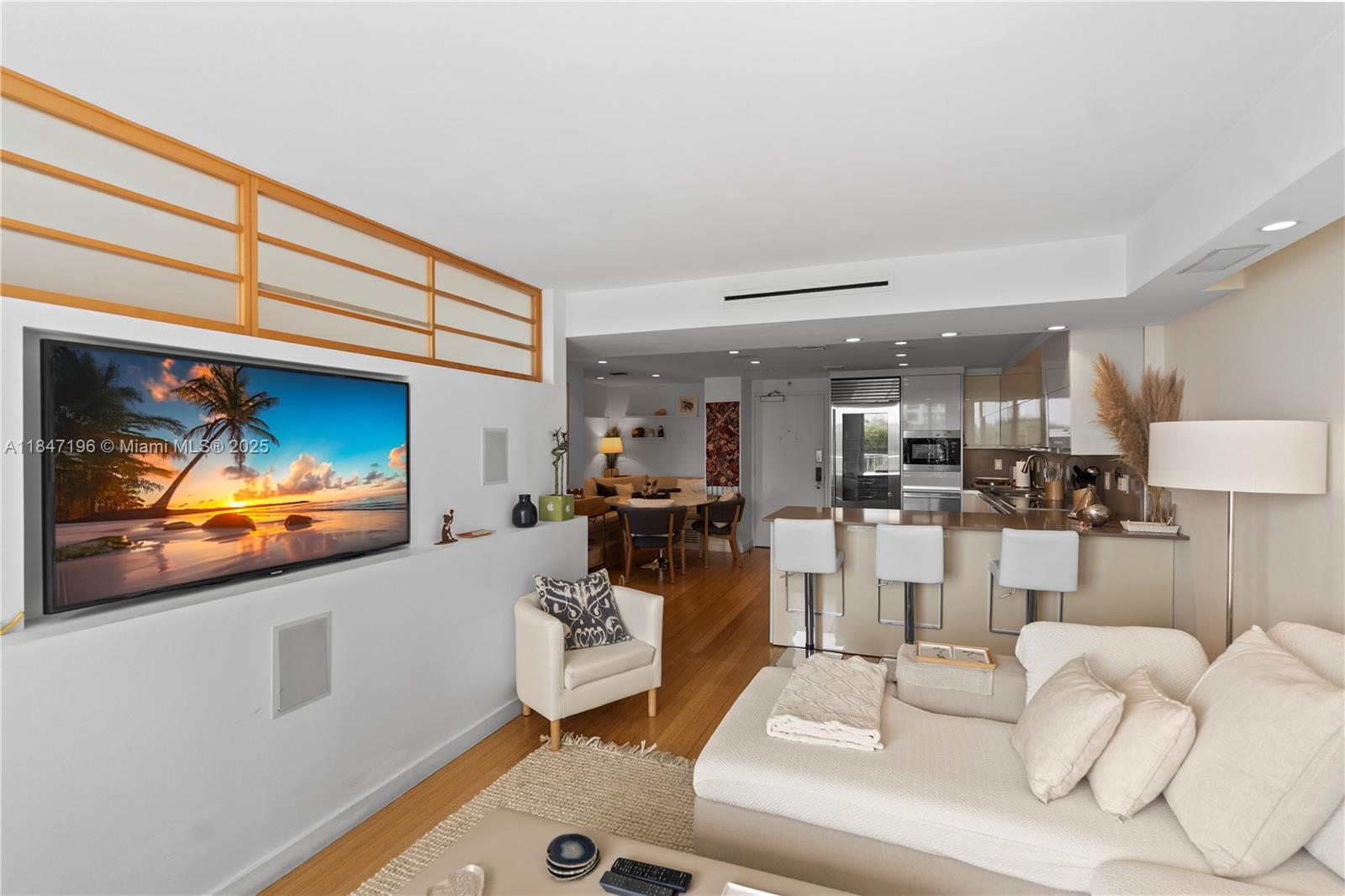 Brickell Miami, FL 33129 - Photo 20 of 44 a living room with furniture and a flat screen tv