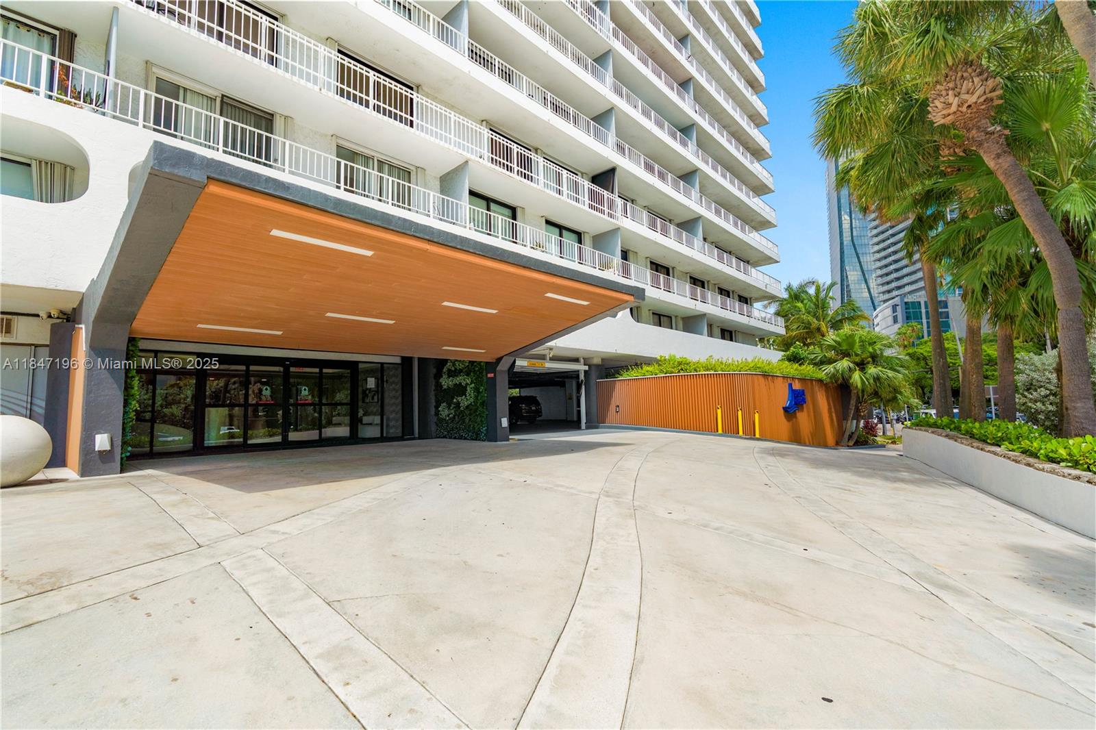 Brickell Miami, FL 33129 - Photo 2 of 44 a front view of a building with a yard