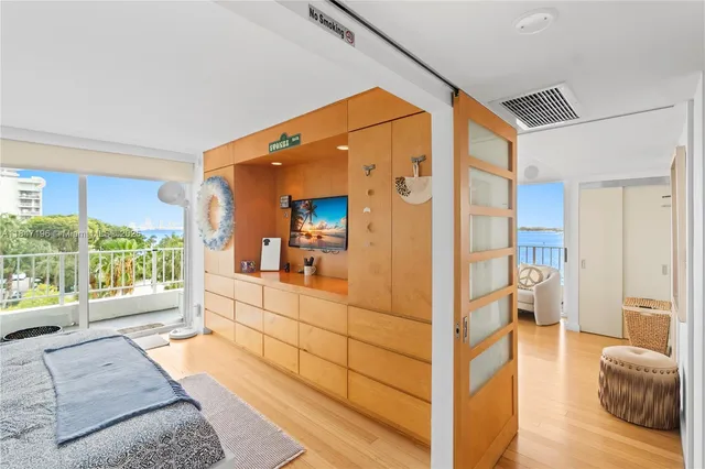 a large living room with a large window