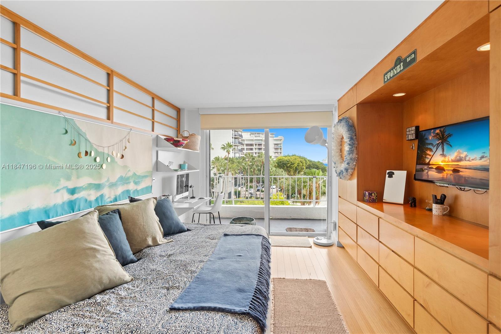 Brickell Miami, FL 33129 - Photo 22 of 44 a large living room with a large window