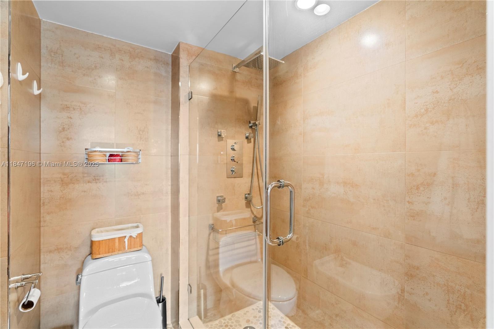 Brickell Miami, FL 33129 - Photo 34 of 44 a bathroom with a shower and a glass door