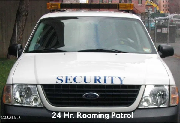 a view of a dining area with furniture window and wooden floor