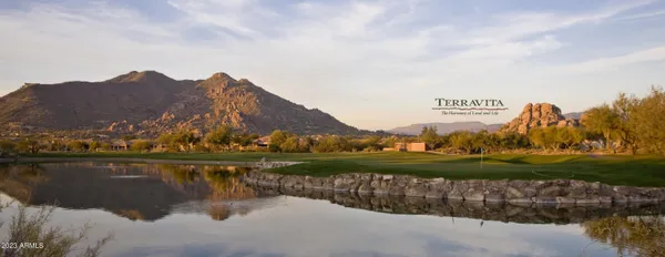 a living room with furniture dining table and a large window