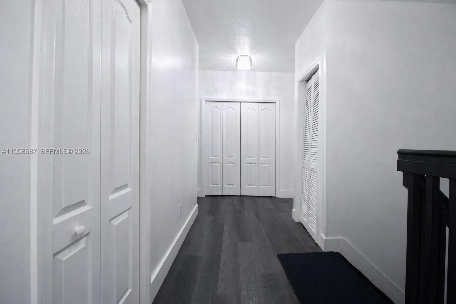15045 Southwest 38th Terrace Miami, FL 33185 - Photo 23 of 37 a view of a room with wooden floor
