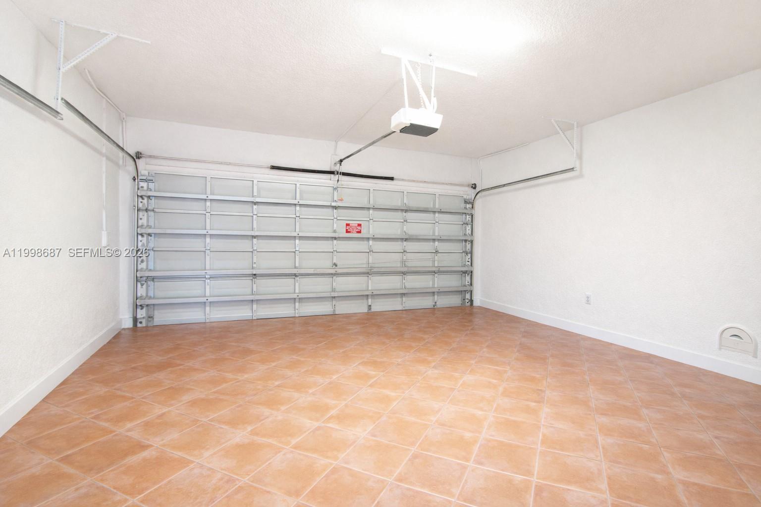 15045 Southwest 38th Terrace Miami, FL 33185 - Photo 37 of 37 a view of a garage