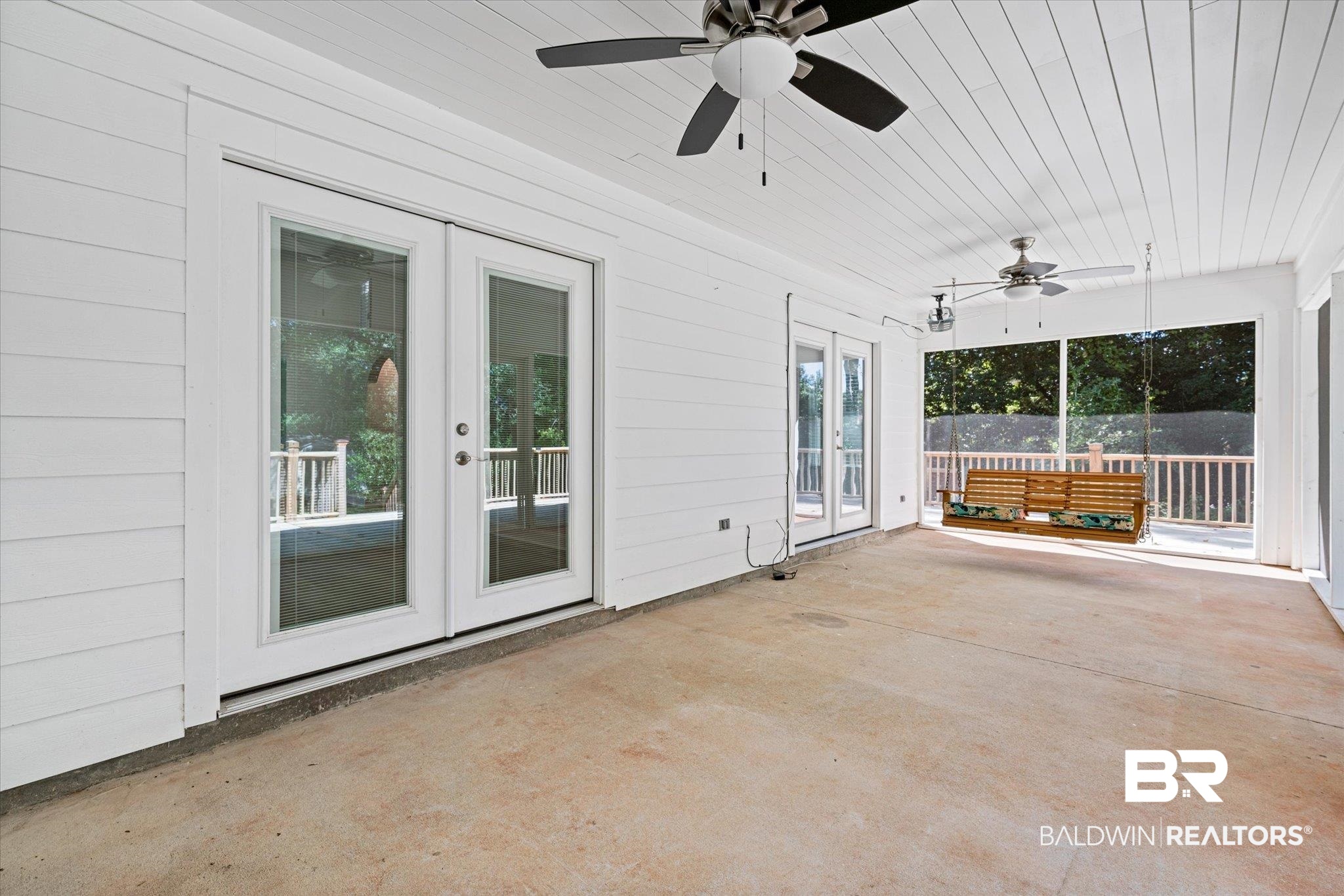 113 Pineridge Road Daphne, AL 36526 - Photo 17 of 22 Unfurnished sunroom featuring french doors, ceiling fan, wooden ceiling, and a wealth of natural light