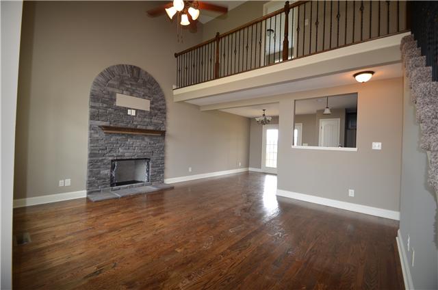 129 Whitetail Ridge Clarksville, TN 37040 - Photo 6 of 20 a view of a livingroom with a fireplace