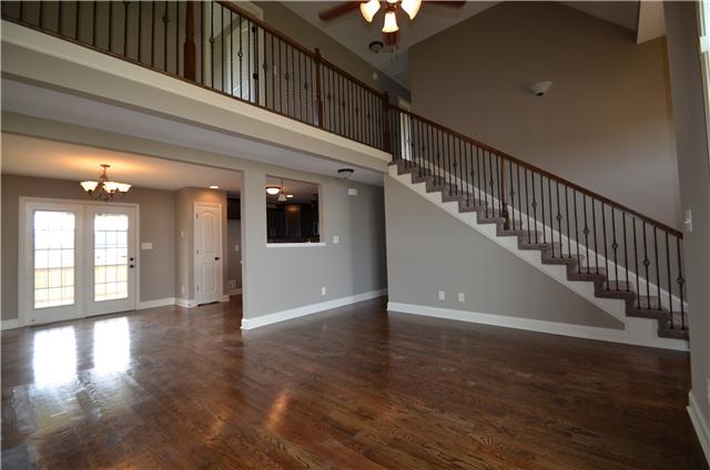 129 Whitetail Ridge Clarksville, TN 37040 - Photo 7 of 20 a view of an entryway wooden floor and chandelier