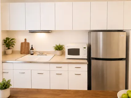a kitchen with appliances and cabinets
