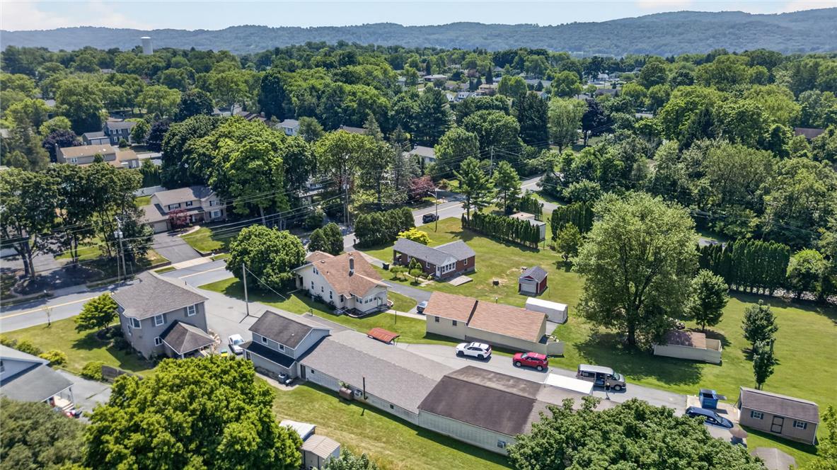 1166 Stones Crossing Road Easton, PA 18045 - Photo 27 of 35 An aerial perspective reveals a charming residential neighborhood amidst a verdant landscape.