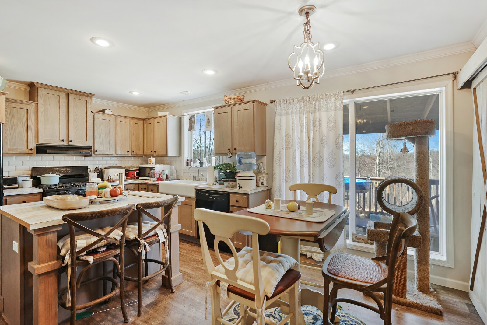 30195 White Oak Road Crawford, TN 38554 - Photo 15 of 54 a view of a dining room with furniture window and wooden floor