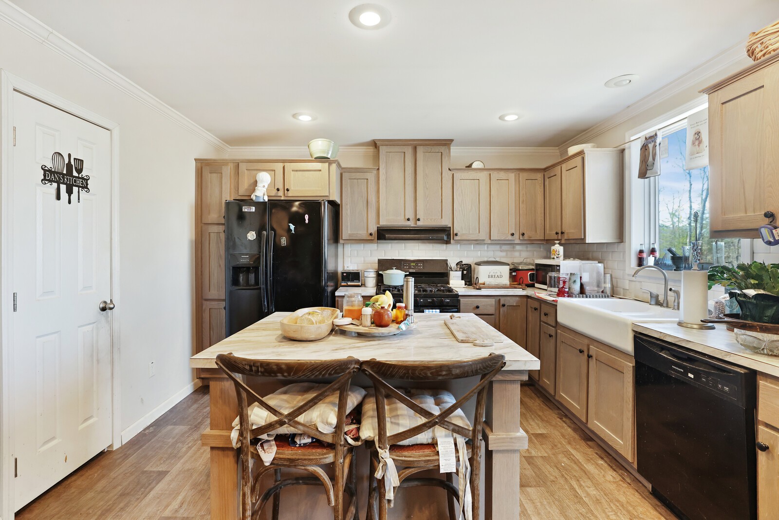 30195 White Oak Road Crawford, TN 38554 - Photo 18 of 54 a kitchen with stainless steel appliances kitchen island granite countertop a dining table and chairs