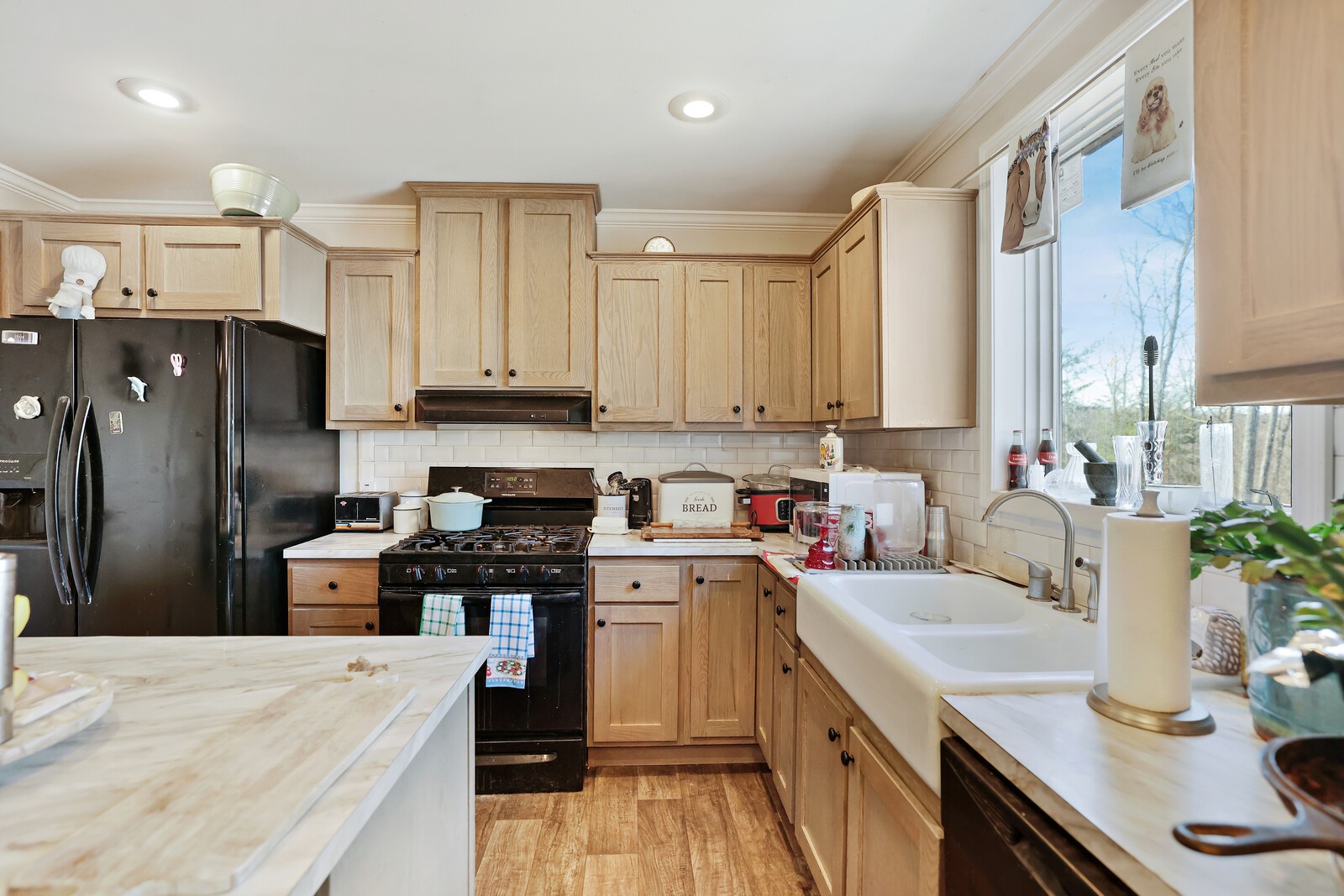 30195 White Oak Road Crawford, TN 38554 - Photo 19 of 54 a kitchen with a sink stove and refrigerator