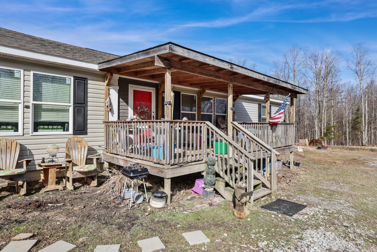 30195 White Oak Road Crawford, TN 38554 - Photo 3 of 54 a view of a house with a yard and deck
