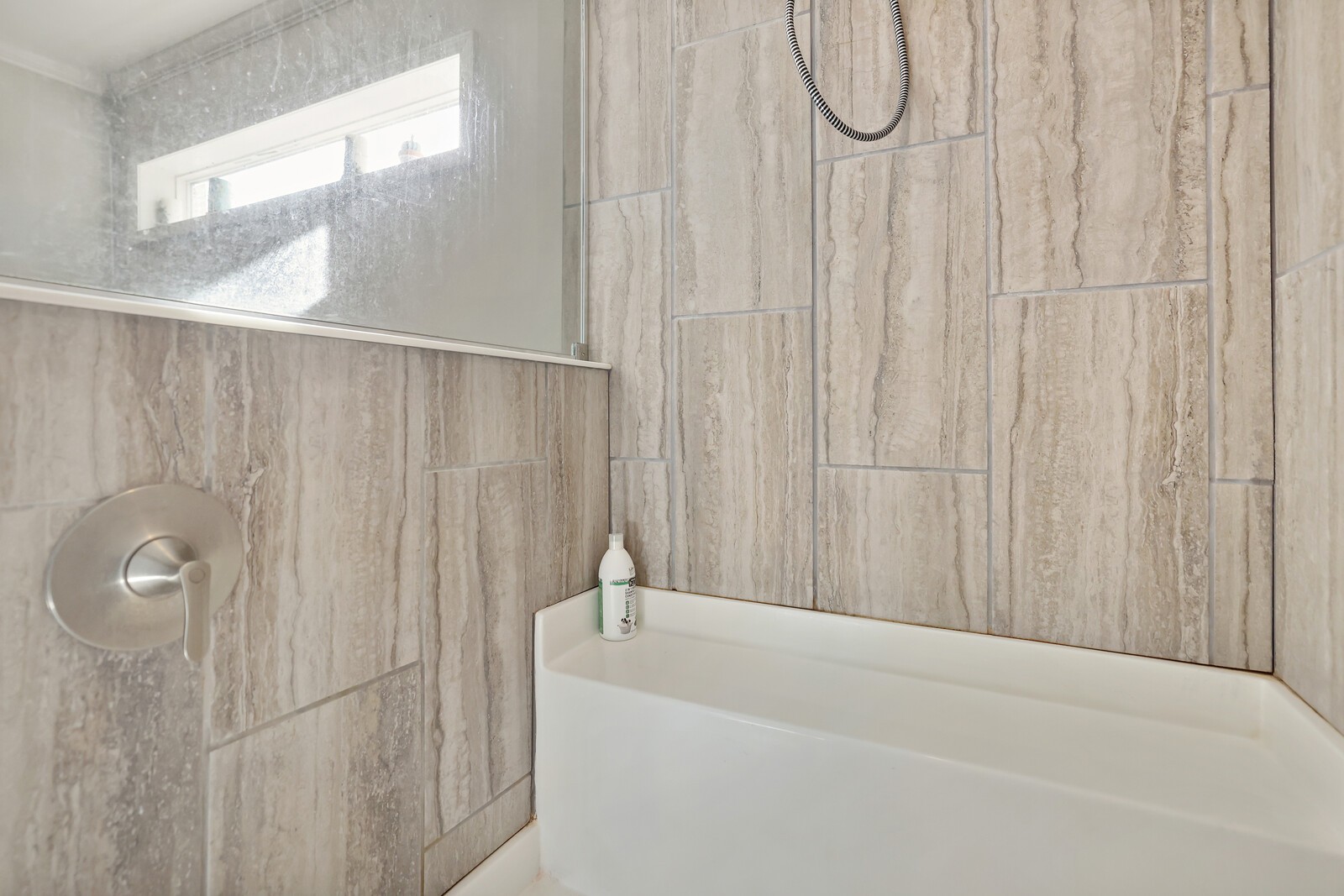 30195 White Oak Road Crawford, TN 38554 - Photo 33 of 54 a bathroom with a bathtub and a shower