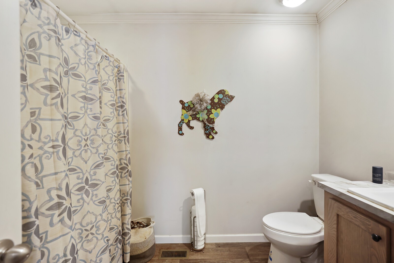 30195 White Oak Road Crawford, TN 38554 - Photo 38 of 54 a bathroom with a toilet and a shower curtain