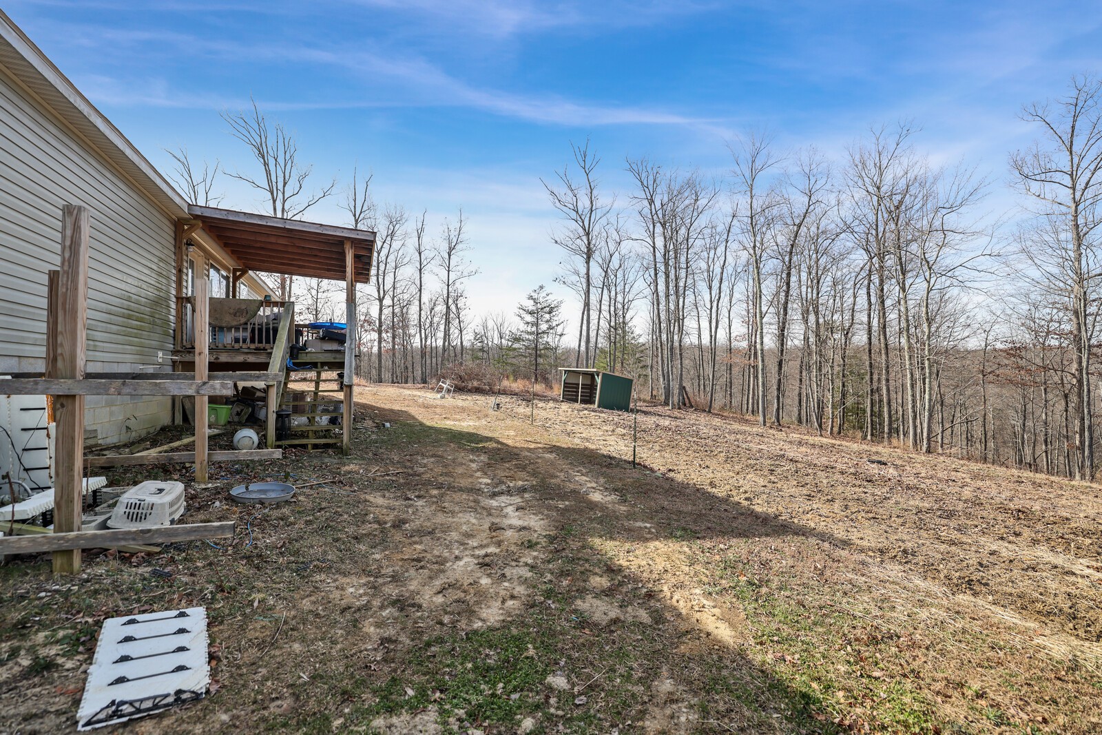 30195 White Oak Road Crawford, TN 38554 - Photo 42 of 54 a backyard of a house with table and chairs
