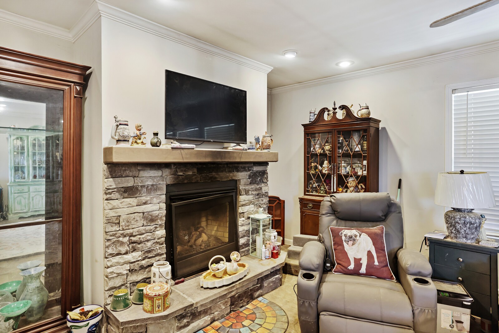 30195 White Oak Road Crawford, TN 38554 - Photo 9 of 54 a living room with furniture a flat screen tv and a fireplace