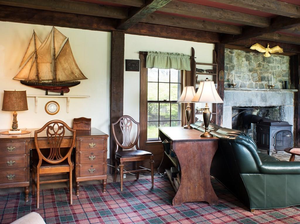 240 Harrington Road Pemaquid, ME 04558 - Photo 13 of 22 The living room features exposed beams.