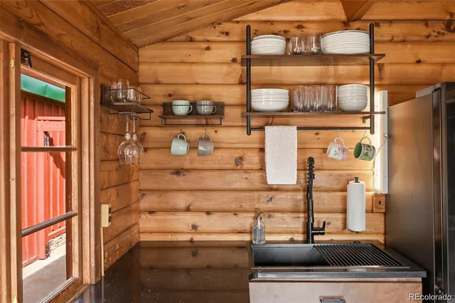 a kitchen with a stove and a microwave