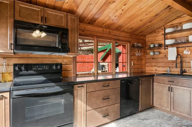 a bedroom with a bed a large window with outer view