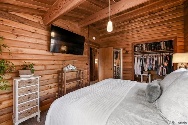 a view of a kitchen with storage and utility room