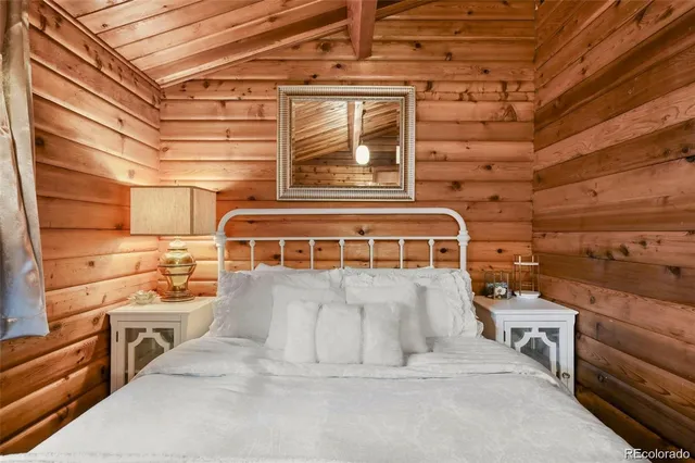 a backyard of a house with outdoor seating