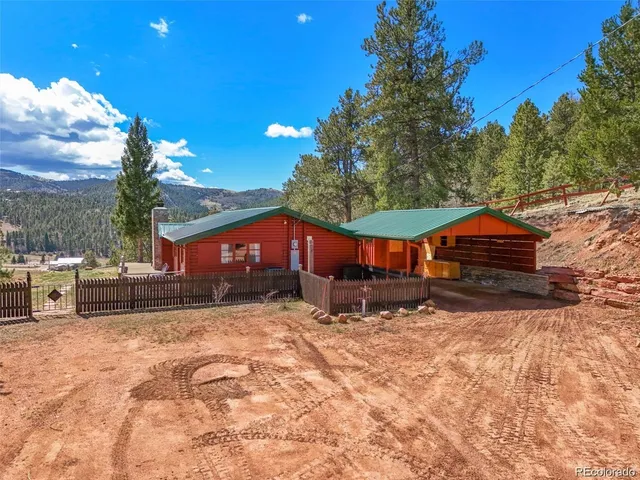 a view of a backyard of a house