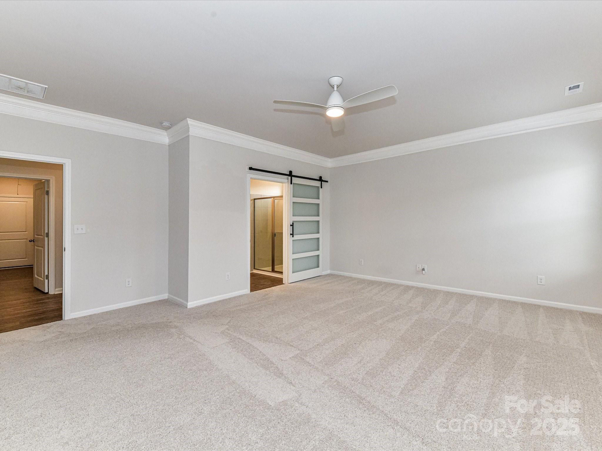 6168 Busch Way Midland, NC 28107 - Photo 21 of 42 a view of an empty room with a window