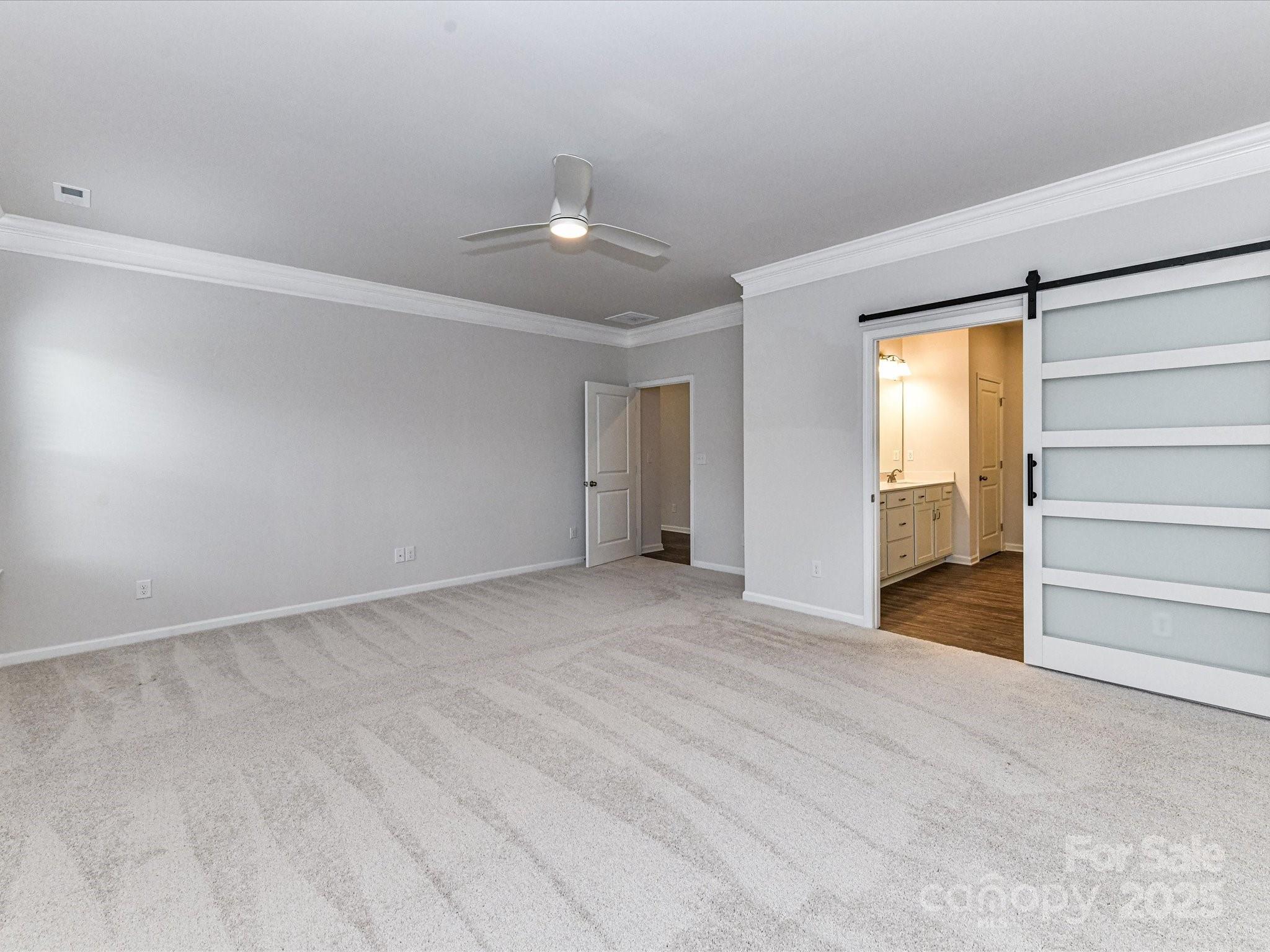 6168 Busch Way Midland, NC 28107 - Photo 22 of 42 an empty room with a natural light