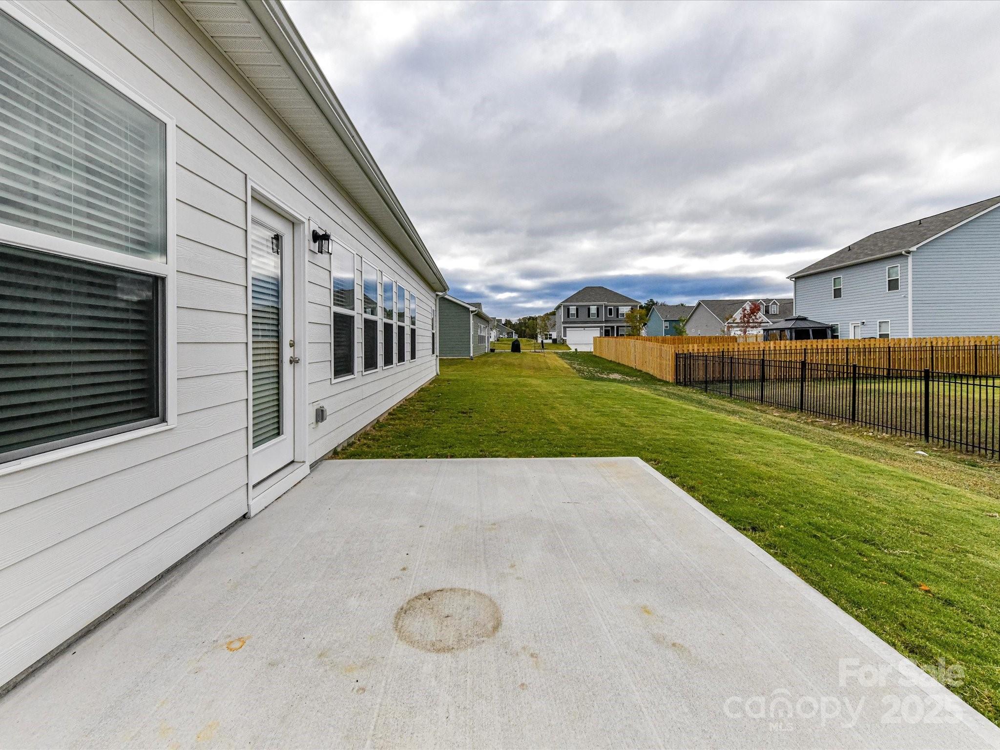 6168 Busch Way Midland, NC 28107 - Photo 37 of 42 a view of a porch with a yard