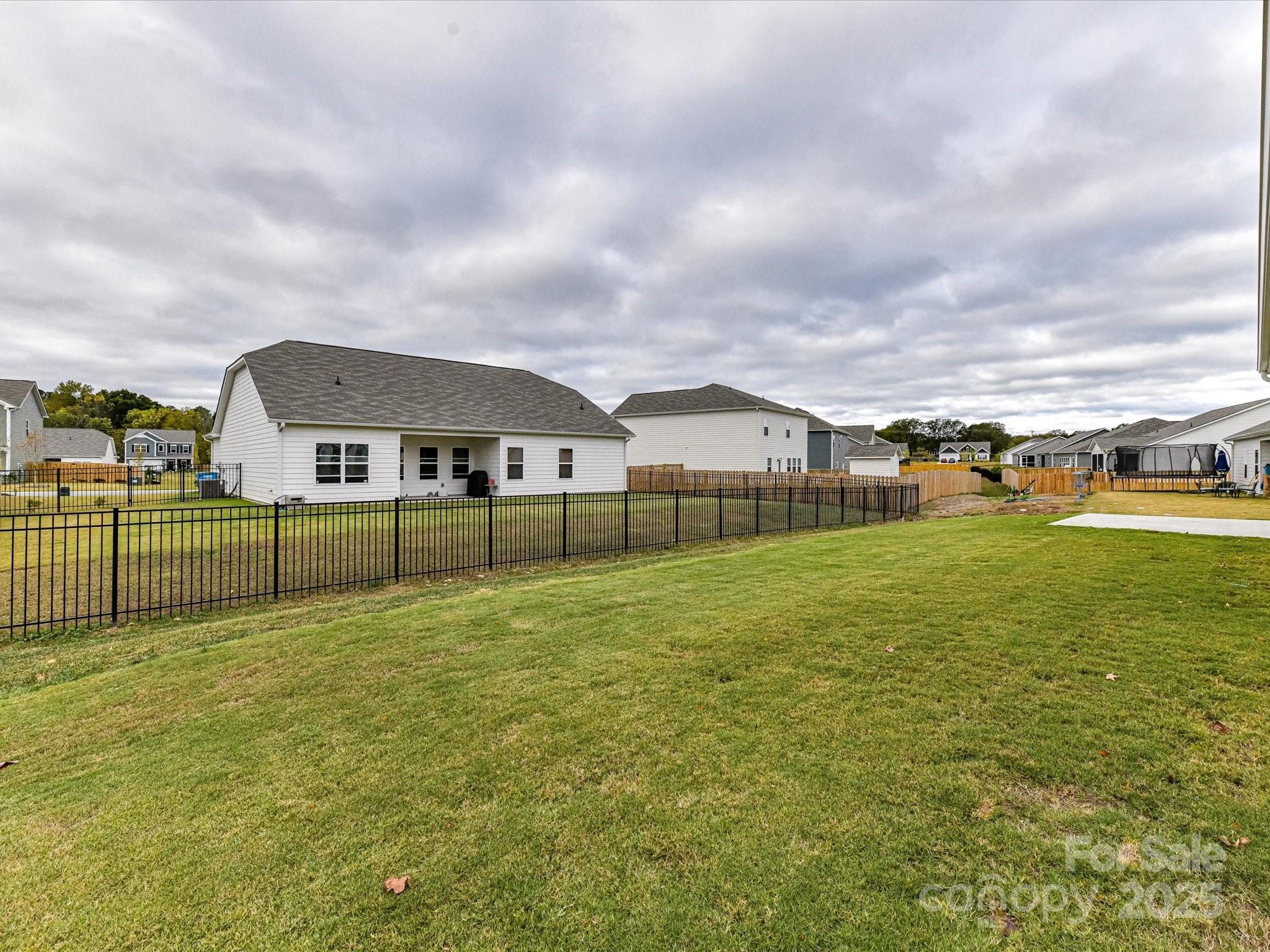 6168 Busch Way Midland, NC 28107 - Photo 41 of 42 a view of a house with a yard