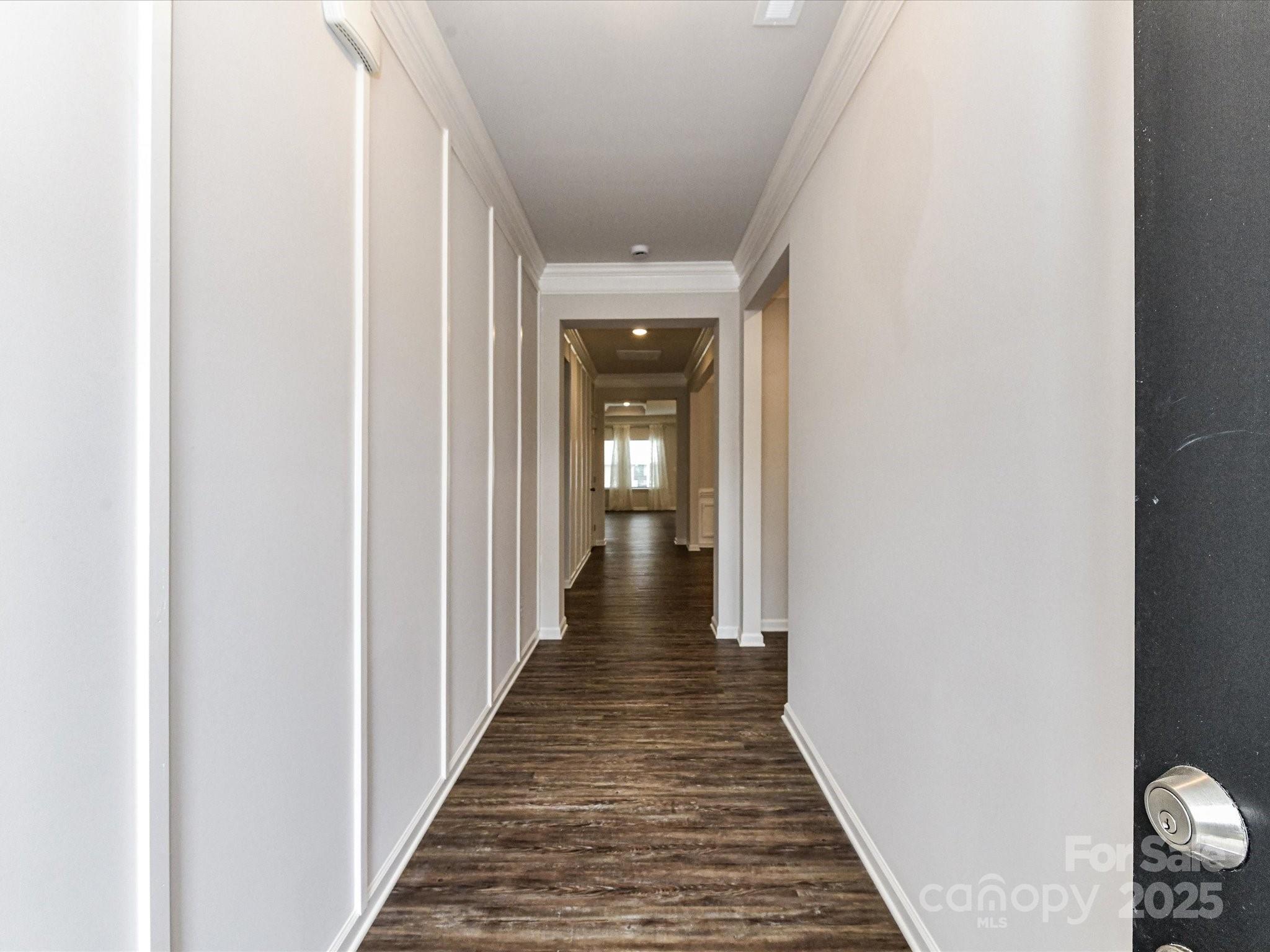6168 Busch Way Midland, NC 28107 - Photo 5 of 42 a view of a hallway with wooden floor